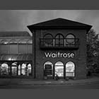 black and white photo of Waitrose Supermarket in St Neots at dusk