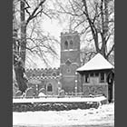 black and white photo of St Bartholomew's Church Great Gransden in snow